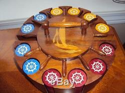 Antique set of 300 Poker Chips with Ships Wheel design