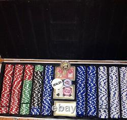 NetJets professional poker set with aluminum carry case. Colored die. 3 decks