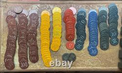 Set of Antique Numbered Poker Chips 5, 10, 25, 100 with antique caddy