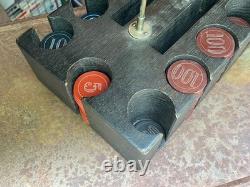 Set of Antique Numbered Poker Chips 5, 10, 25, 100 with antique caddy